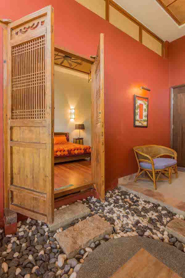 Bright walls and Oriental furnishing add character to the sleeping area filled with Zen details
