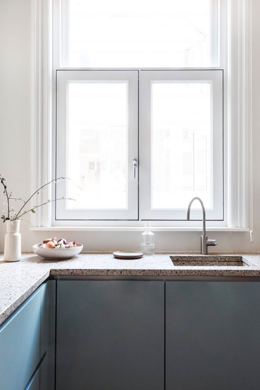 The terrazzo effect adds an interesting graphic feature to the kitchen (Image: Courtesy of Avenue Design Studio)