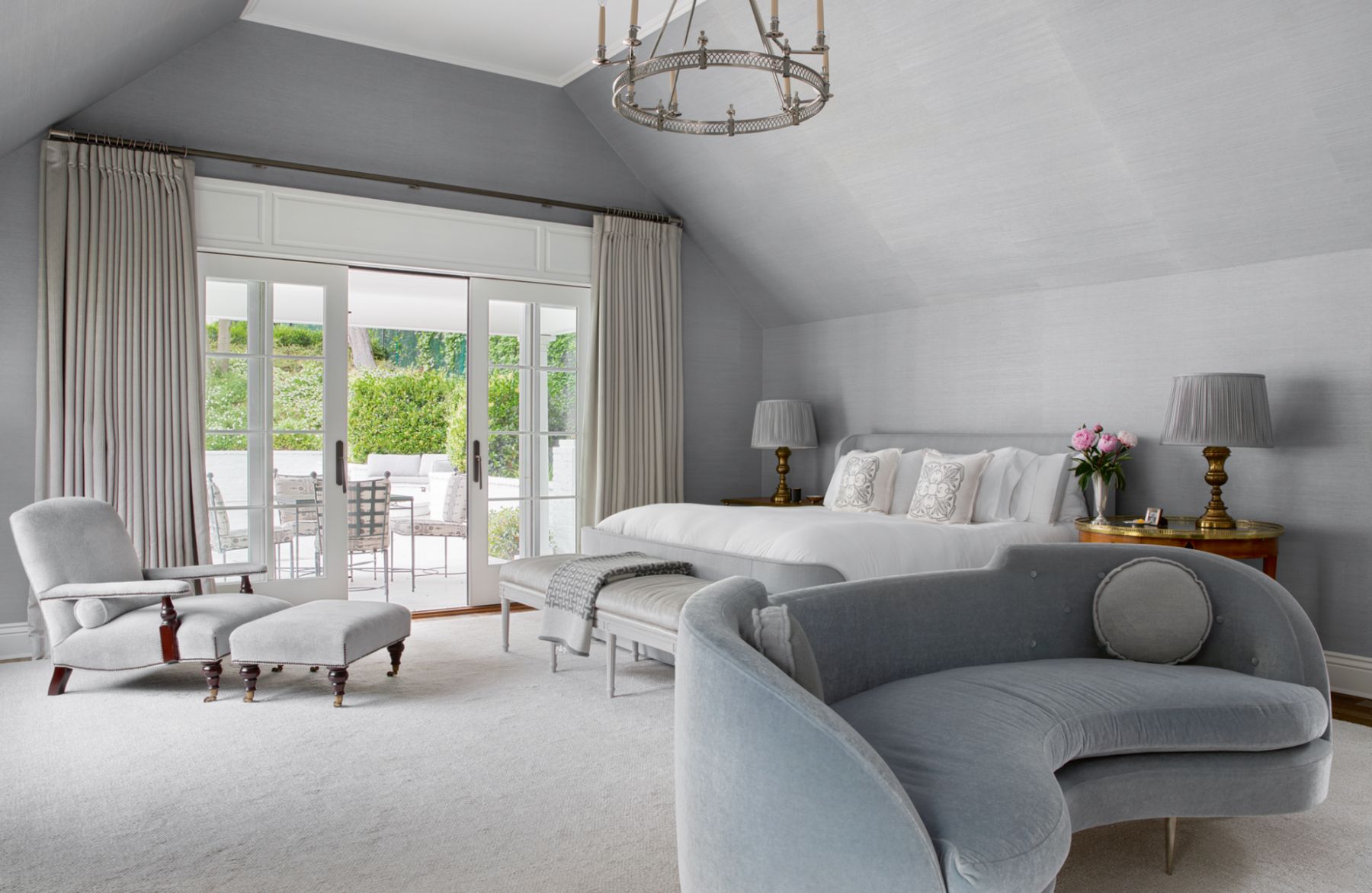Grey tones in the master bedroom add to its restful aura