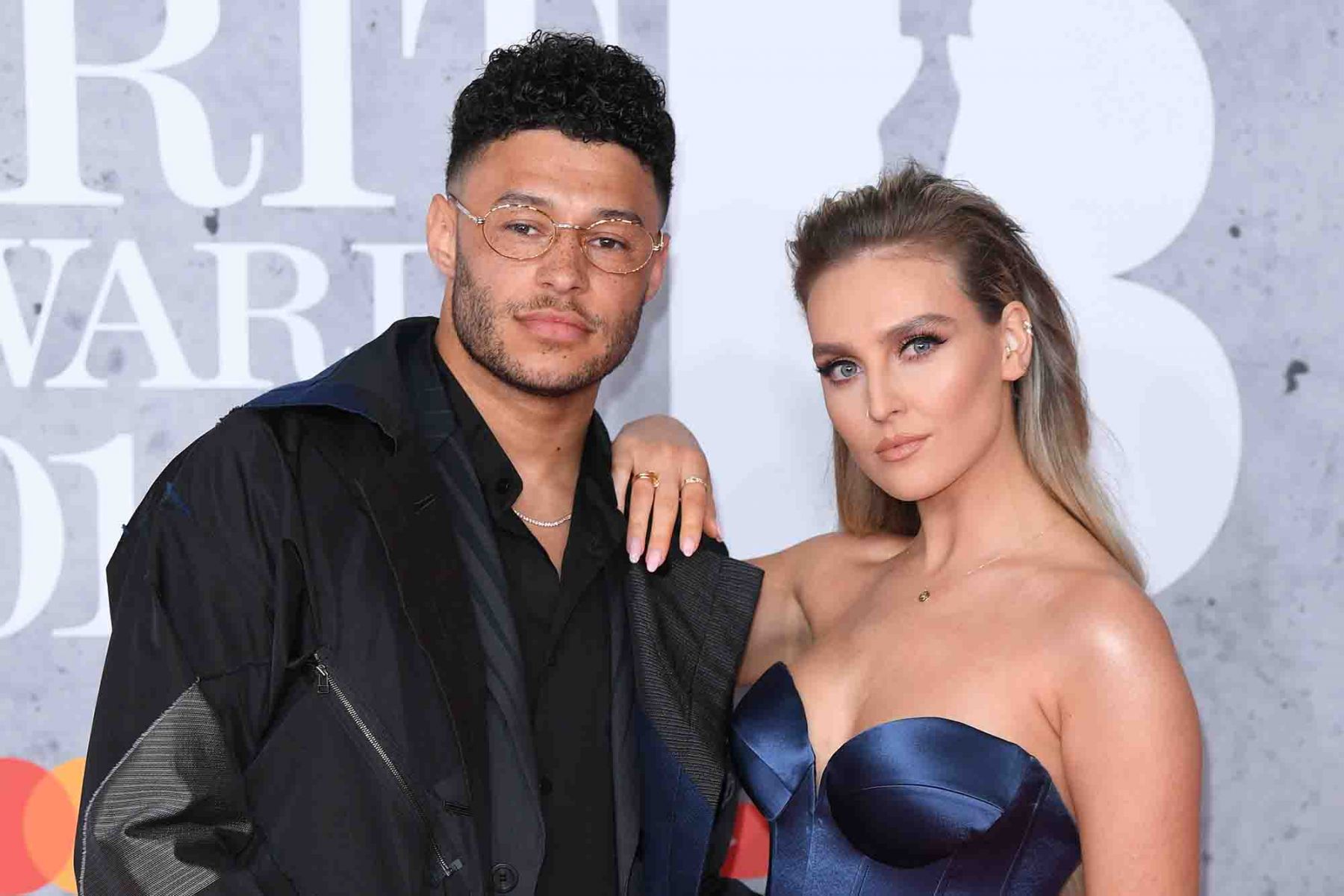 Alex Oxlade-Chamberlain and Perrie Edwards attend The BRIT Awards 2019. (Photo: WireImage)