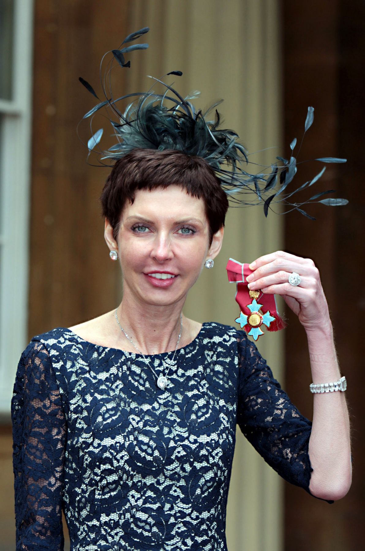 bet365 Chief Executive Denise Coates with her Commander of the British Empire (CBE) medal which was presented by the Prince of Wales during an Investiture ceremony at Buckingham Palace, central London. PRESS ASSOCIATION Photo. Picture date: Tuesday May 15, 2012. See PA story ROYAL Investitures. Photo credit should read: Sean Dempsey/PA Wire LONDON, UNITED KINGDOM - MAY 15: medal, which was presented by Prince Charles, Prince of Wales at an Investiture ceremony at Buckingham Palace on May 15, 2012 in London