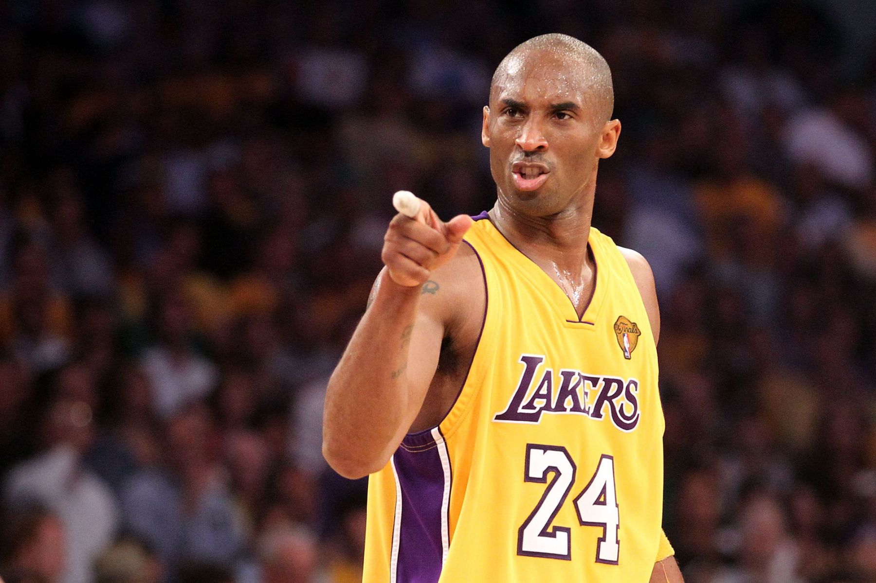 LOS ANGELES, CA - JUNE 17:  Kobe Bryant #24 of the Los Angeles Lakers points in the second quarter of Game Seven of the 2010 NBA Finals against the Boston Celtics at Staples Center on June 17, 2010 in Los Angeles, California.  NOTE TO USER: User expressly acknowledges and agrees that, by downloading and/or using this Photograph, user is consenting to the terms and conditions of the Getty Images License Agreement.  (Photo by Ronald Martinez/Getty Images)