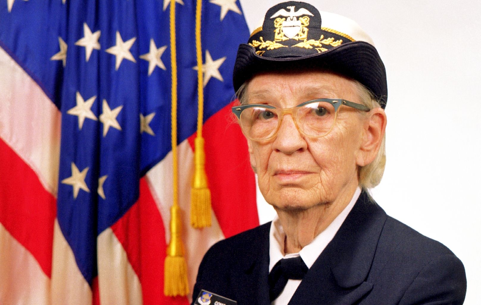 Commodore Grace M. Hopper, USN (covered).
