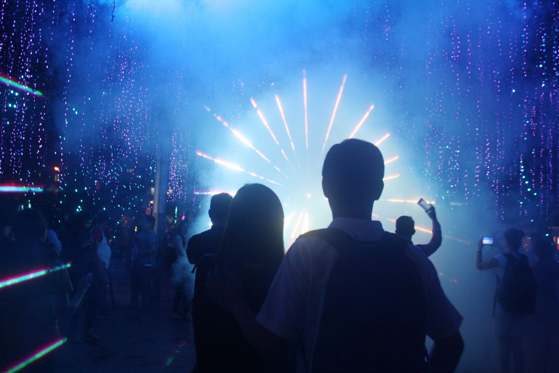 MAKATI CITY, NCR, PHILIPPINES - 2016/11/15: Filipinos watch the lights and sounds show at Ayala Triangle Gardens in Makati. The show features thousands of LED lights dancing to the tune of Christmas songs at the heart of the central business district. It is one of the most popular Christmas display in the country which attracts thousands of visitors every year. (Photo by Marlo Cueto/Pacific Press/LightRocket via Getty Images)
