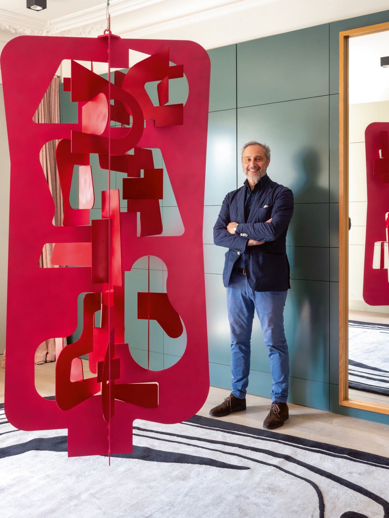 Frédéric Crouzet stands next to Wings of Desire, an artwork he designed