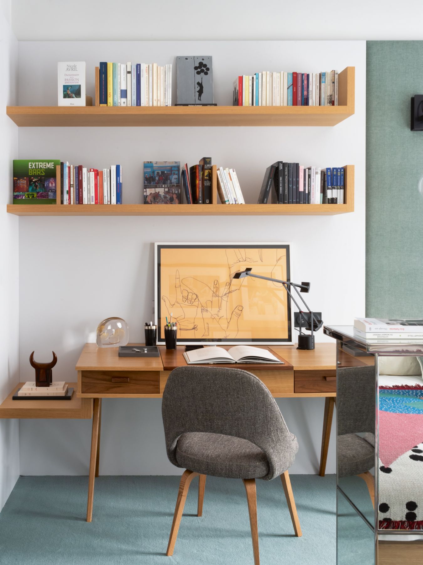 The study is a serene space with its generous use of light wood