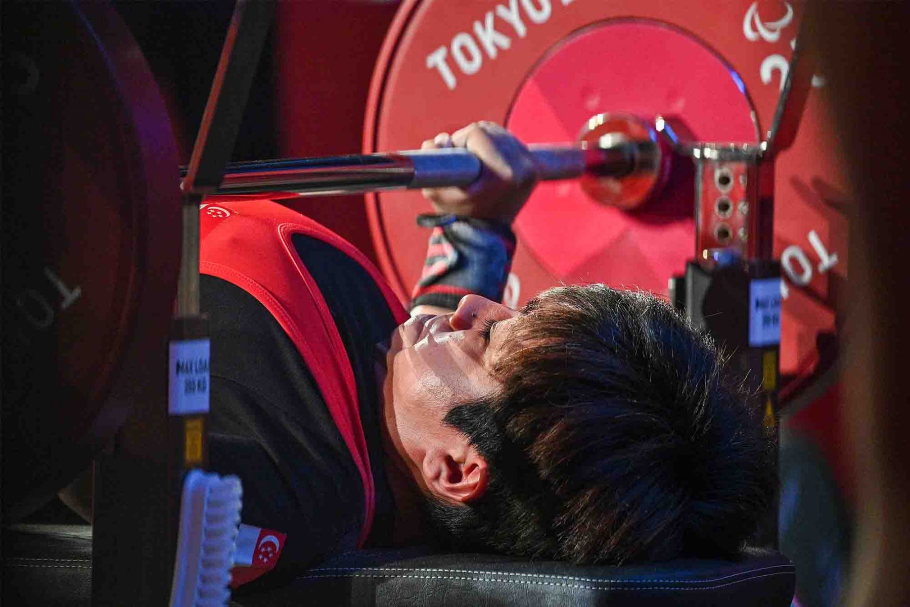 Singapore's Nur Aini Mohamad Yasli competes in the women's powerlifting 45k. (Photo: Sport Singapore and AFP)