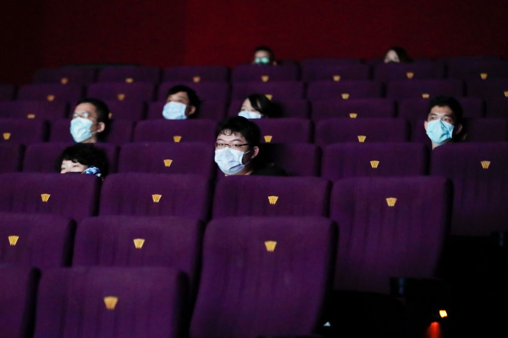 People with face masks in a cinema, as Covid-19 restrictions have been partially lifted after the island combating a serious outbreak causing multiple deaths and infections, in Taipei, Taiwan, 13 July 2021. Non essential businesses including restaurants, libraries and sport facilities have been allowed to reopen by Taiwan CDC, but several local authorities did not follow in fear of uncurbed transmissions of the coronavirus, whilst the country is facing vaccines buying and supply difficulties (Photo by Ceng
