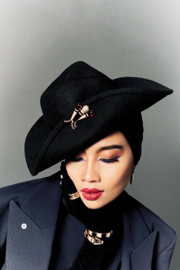 Yuna wears blazer by Kit Woo and jewellery by Bulgari
