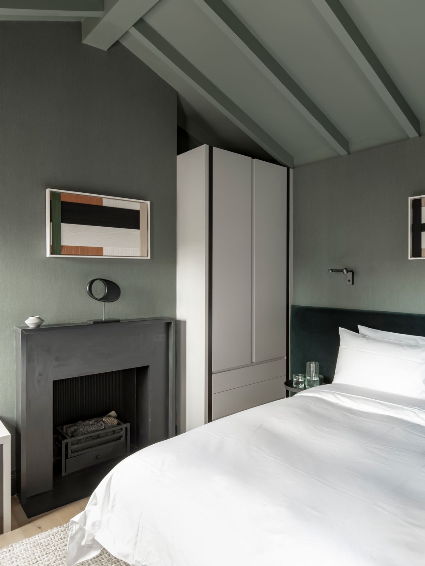 The vaulted ceiling in the master bedroom adds spatial volume