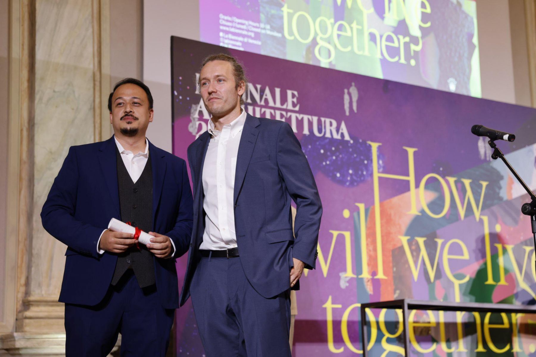 Curators Sudarshan V. Khadka Jr. and Alexander Eriksson Furunes pose for a photo after receiving the award during the 17th International Architecture Exhibition of the La Biennale di Venezia at Ca’ Giustinian. (Photo courtesy of Antique Lone District Rep. Loren Legarda)