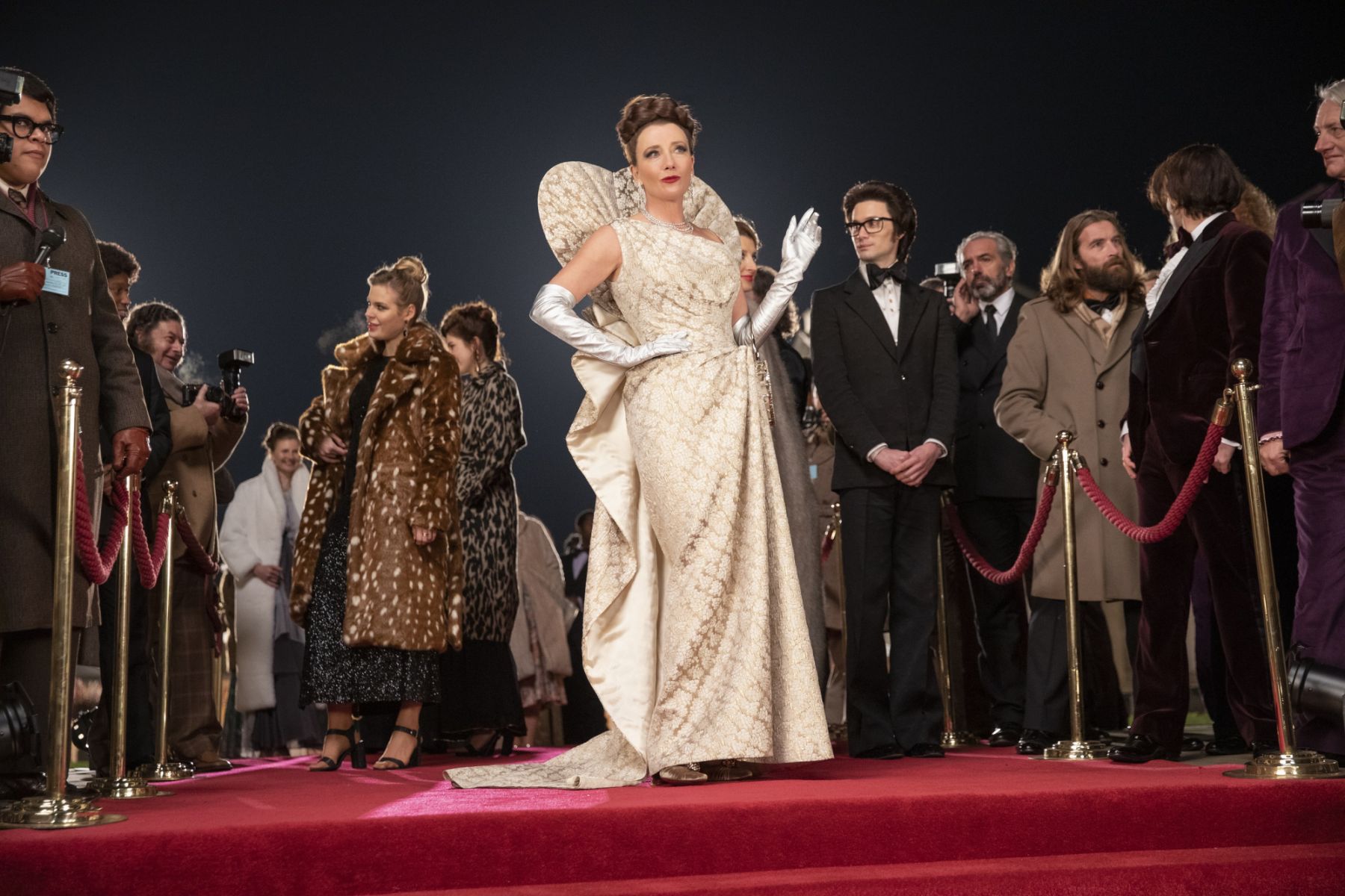 Emma Thompson as the Baroness and Andrew Leung as Jeffrey in Disneyâs live-action CRUELLA. Photo by Laurie Sparham. © 2021 Disney Enterprises, Inc. All Rights Reserved.