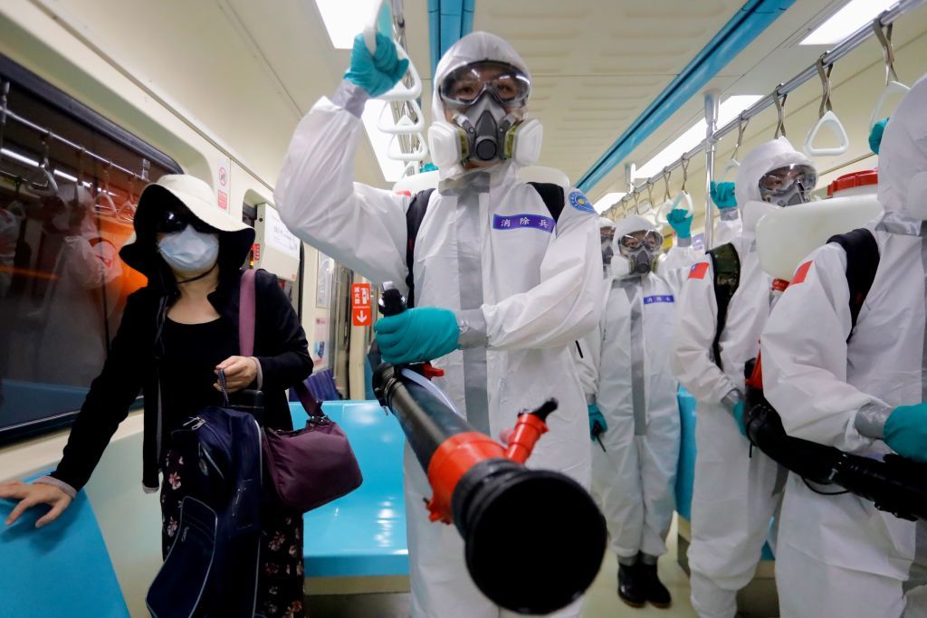 Chemical troops disinfecting public areas and transport are seen traveling on the underground, as there have been cases of infections and deaths related to Covid-19, in Taipei, Taiwan, 25 May 2021. Starting from July 22, Restaurants and non essential businesses in some cities have been reopened, but the island is facing difficulties in the supply of AstraZeneca, Biontech, Moderna and Medigen vaccines, even though its economy is showing good signs. (Photo by Ceng Shou Yi/NurPhoto via Getty Images)