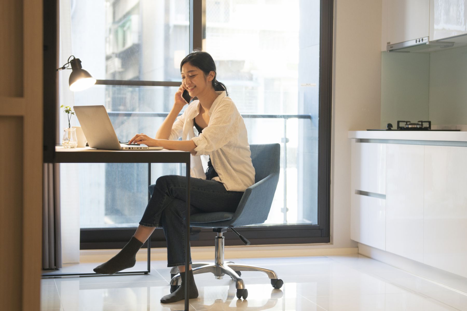 asian woman working at home