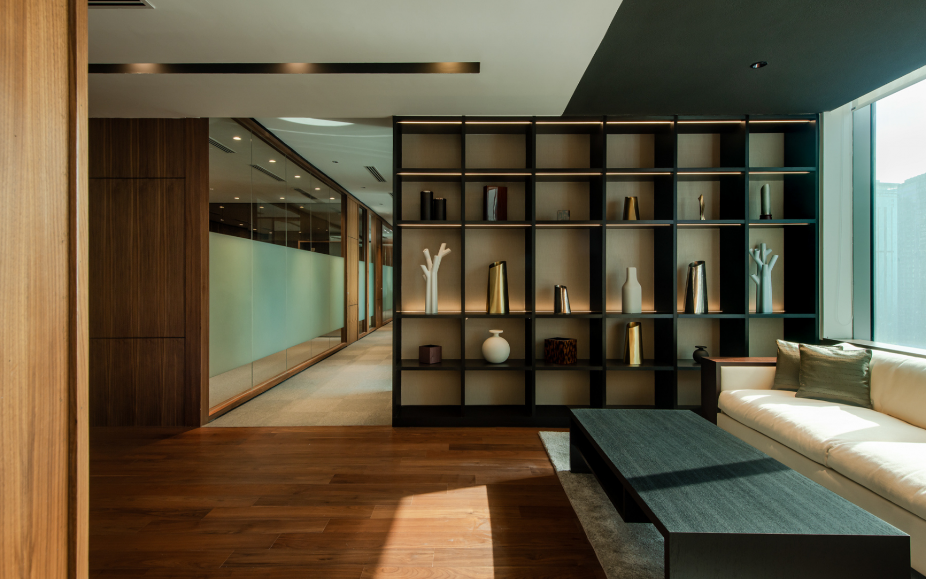 Warm wood and metallic highlights were used throughout the office