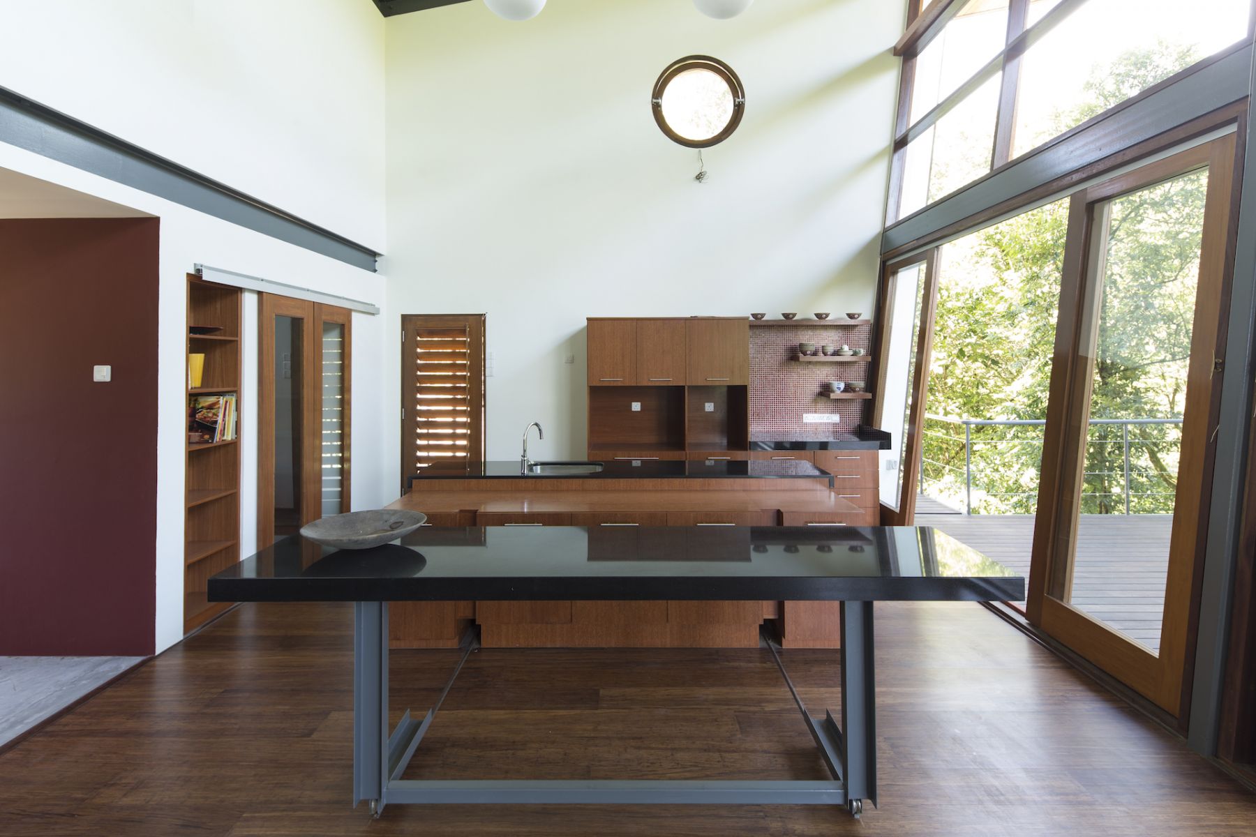 The kitchen features custom designed built ins