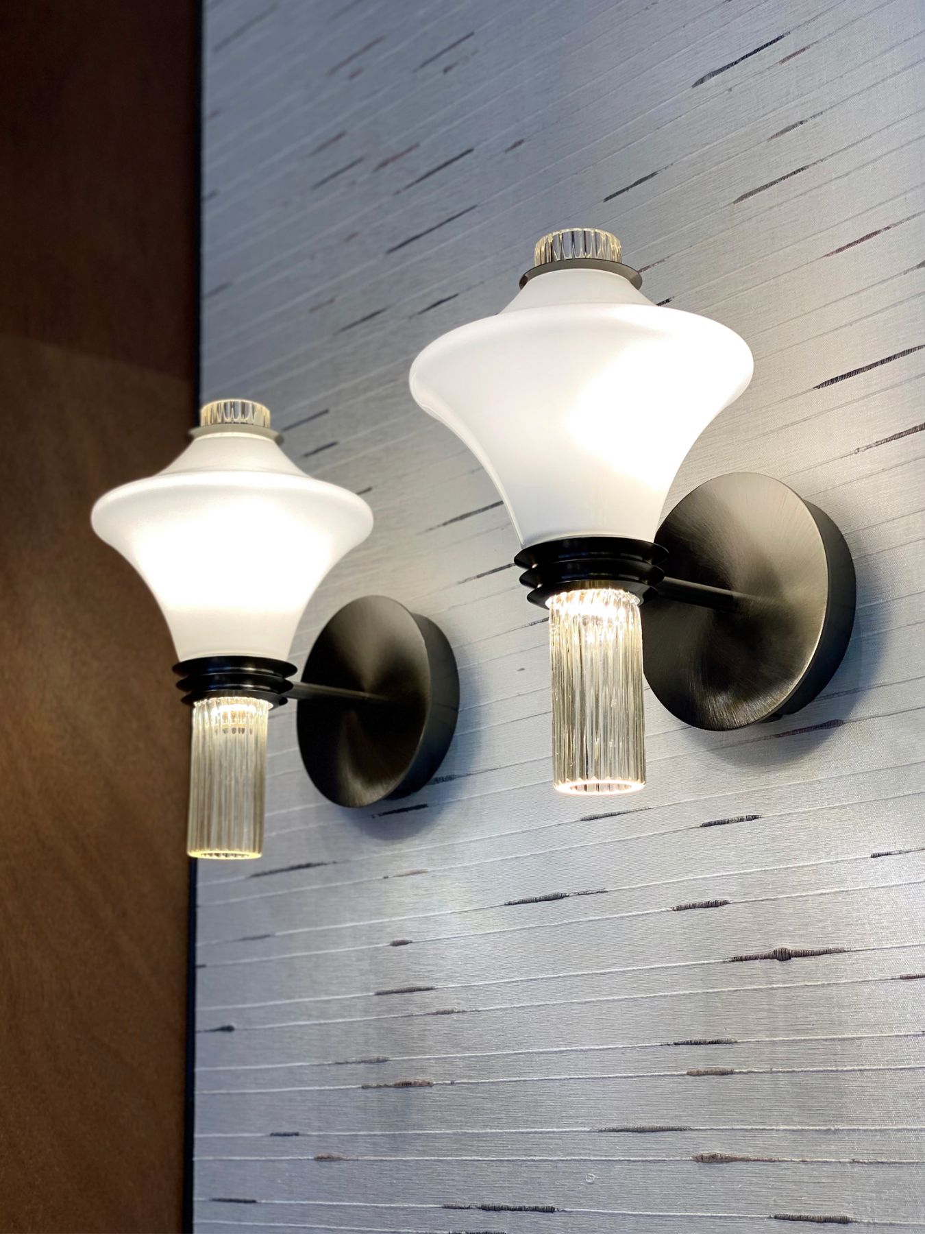 Inspired by the Art Deco era, the Metropolis wall scones illuminates any space with its bright design