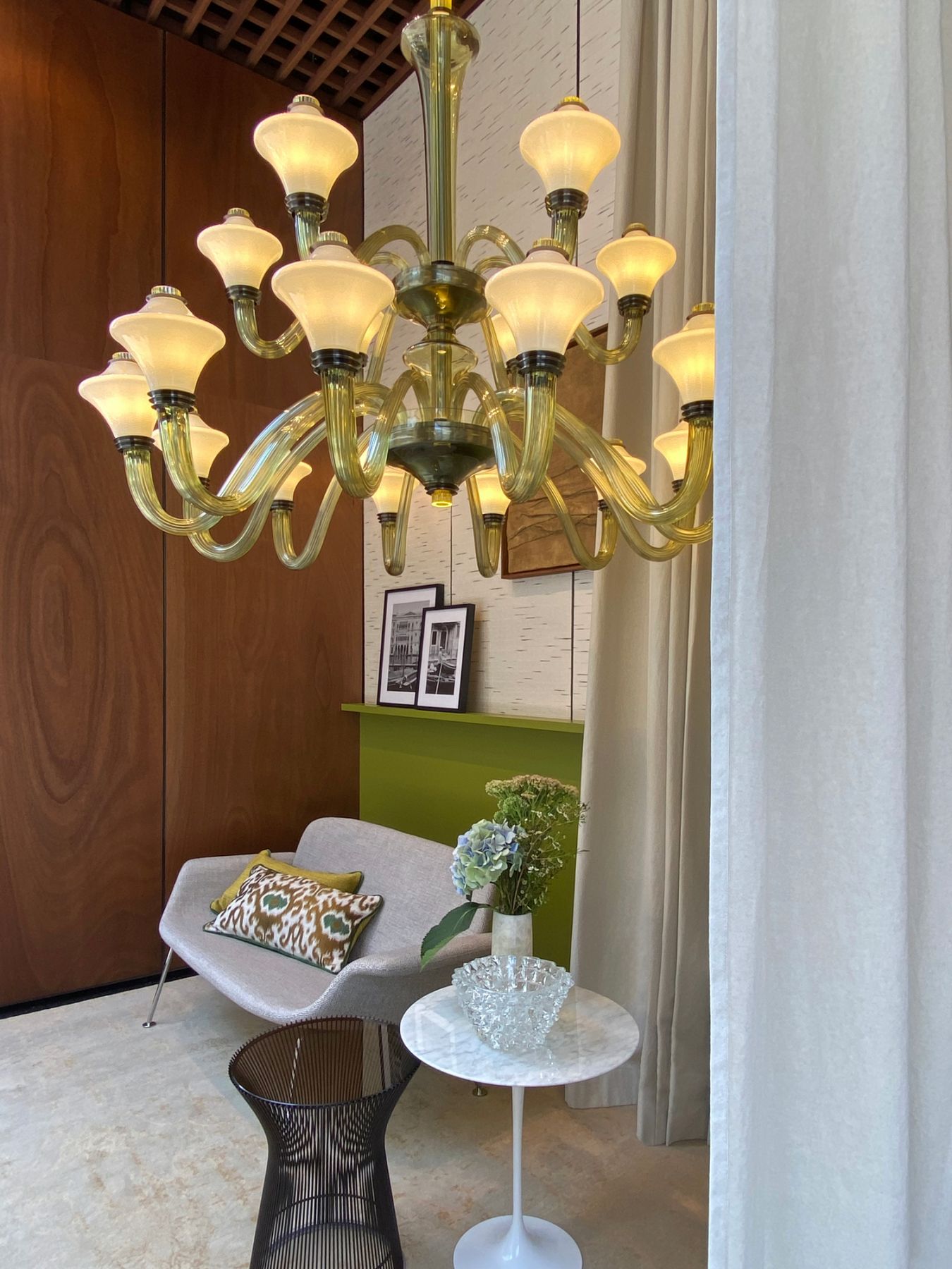 Metropolis features opaline glass cups embraced at both ends by metal collars