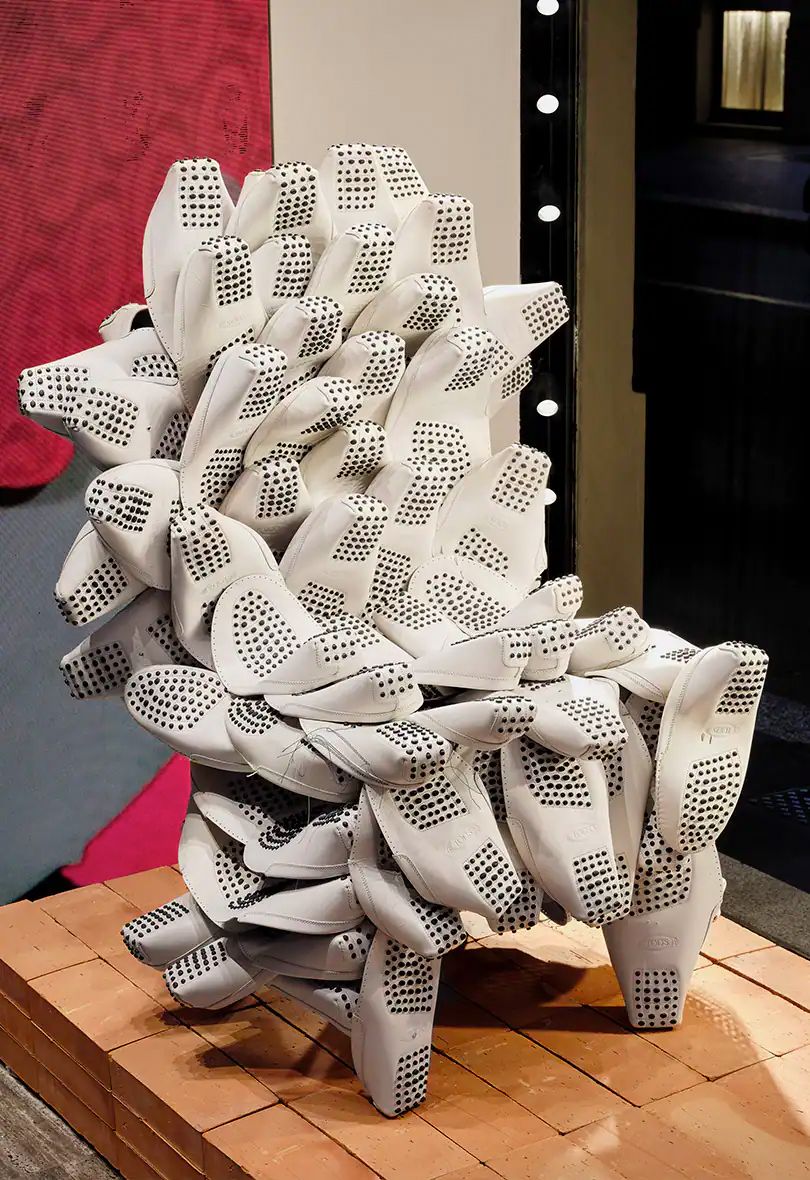 Tod's and artist Willie Cole collaborated to create this unique chair, formed out of leftover materials from Tod’s production line