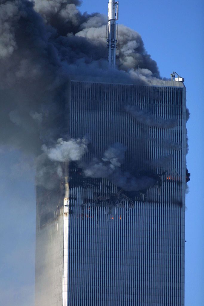 The World Trade Center burning after two airliners crashed into the buildings in New York City, Tuesday September 11, 2001. Photo by Gabe Palacio/ImageDirect.