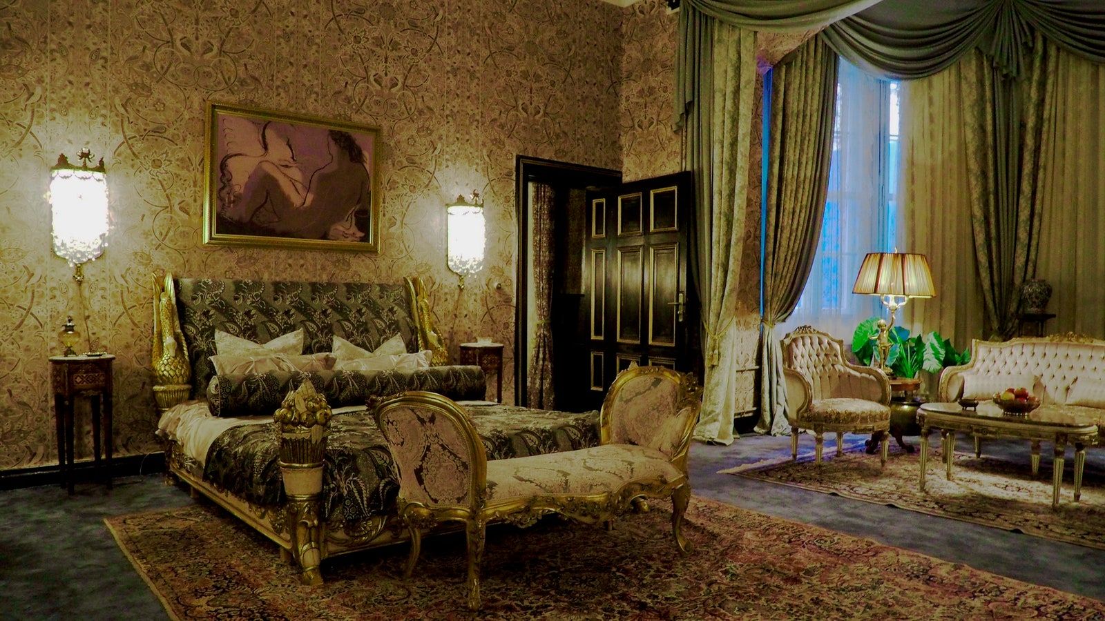 The Paris hotel room features opulent details and a glamorous gold colour palette (Image: Courtesy of Netflix)
