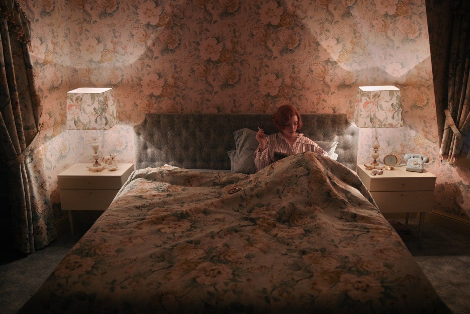 Large statement patterns appears throughout the rooms in The Queen's Gambit, as seen here in Mrs. Wheatley’s bedroom (Image: Courtesy of Netflix)