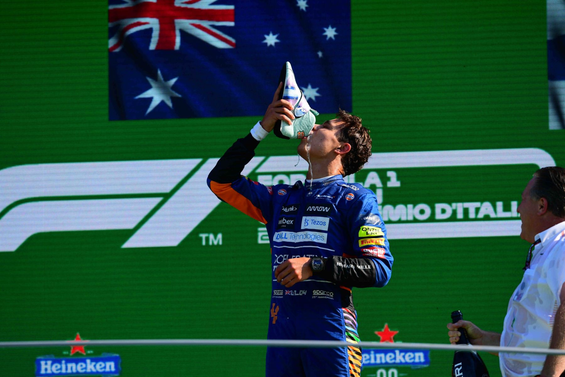 Lando Norris McLaren F1 Team celebrate during podium ceremony after race of Italian GP, 14th round of Formula 1 World Championship in Autodromo Internazionale di Monza, in Monza, Lombardia, Italy, 12 September 2021 (Photo by Andrea Diodato/NurPhoto via Getty Images)