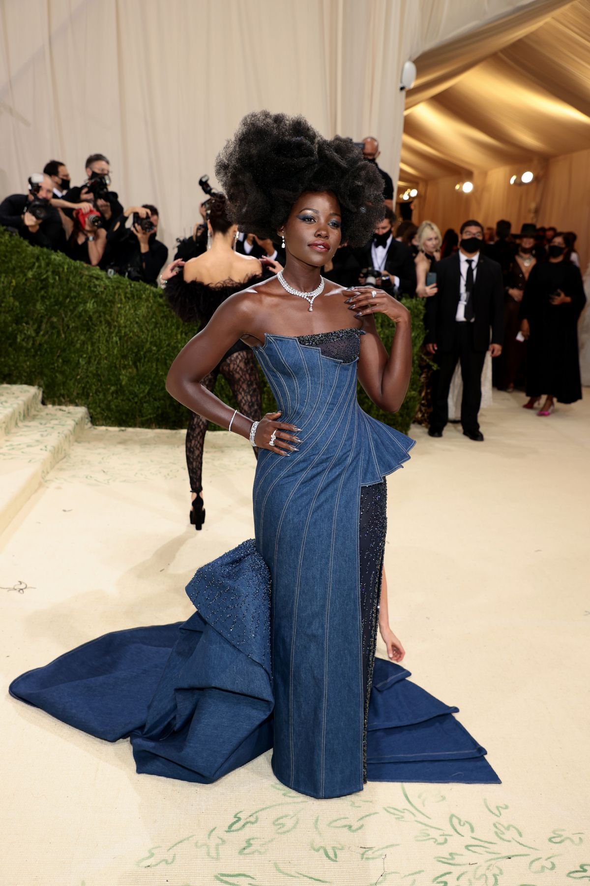 NEW YORK, NEW YORK - SEPTEMBER 13: Lupita Nyong'o attends The 2021 Met Gala Celebrating In America: A Lexicon Of Fashion at Metropolitan Museum of Art on September 13, 2021 in New York City. (Photo by Dimitrios Kambouris/Getty Images for The Met Museum/Vogue )