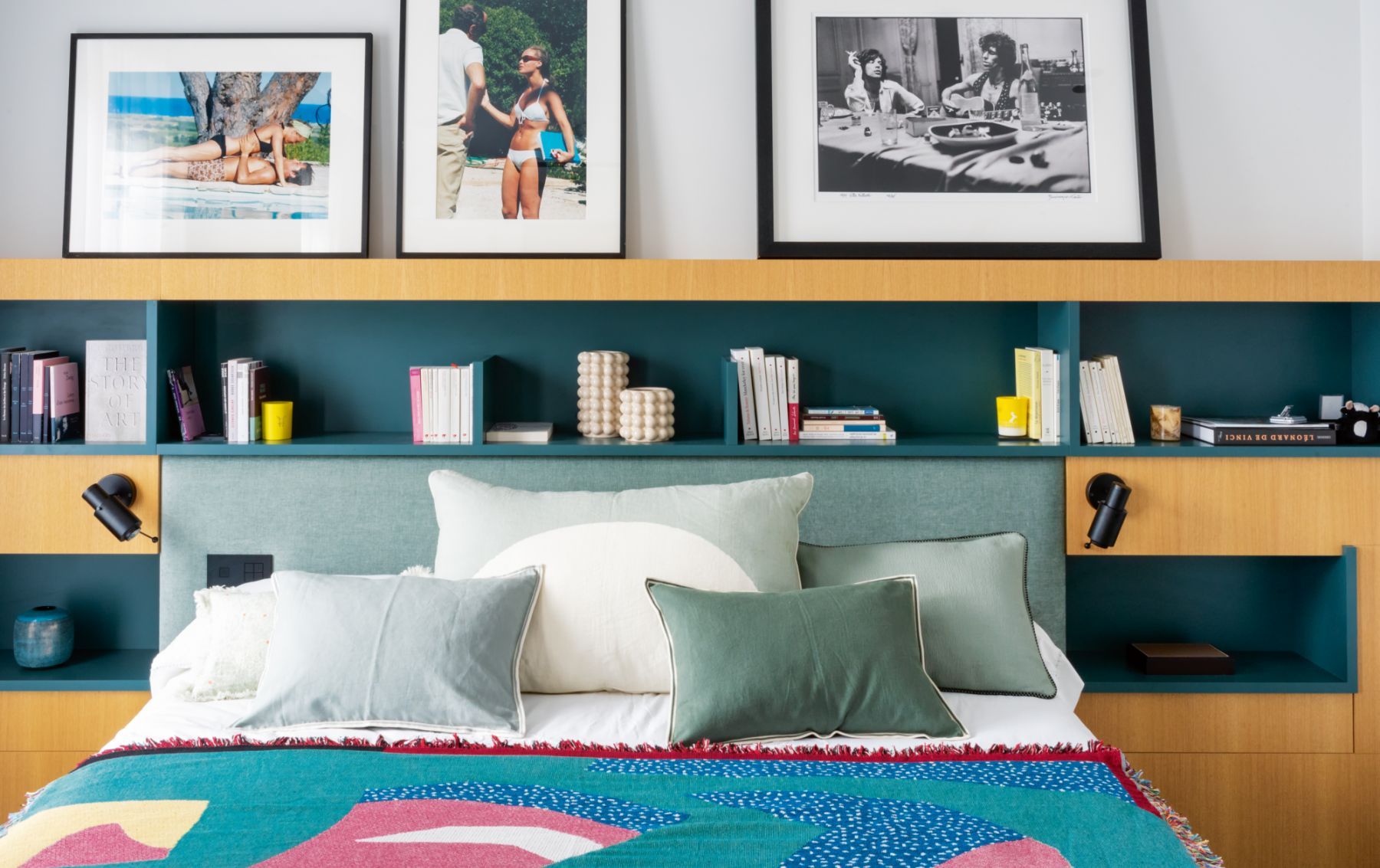 Built-in shelving adds extra storage space in this vibrant bedroom designed by French designer Frédéric Crouzet (Photo: Bénédicte Drummond)