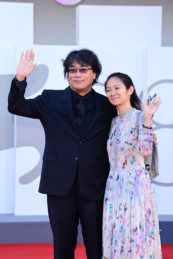 VENICE, ITALY - SEPTEMBER 01: Jury President Bong Joon Ho and Venezia78 Jury member Chloé Zhao attend the red carpet of the movie "Madres Paralelas" during the 78th Venice International Film Festival on September 01, 2021 in Venice, Italy. (Photo by Daniele Venturelli/WireImage)