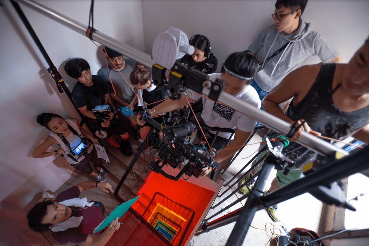 Setting up a film shoot around a staircase for the short film Daffodil by Nicola Fan