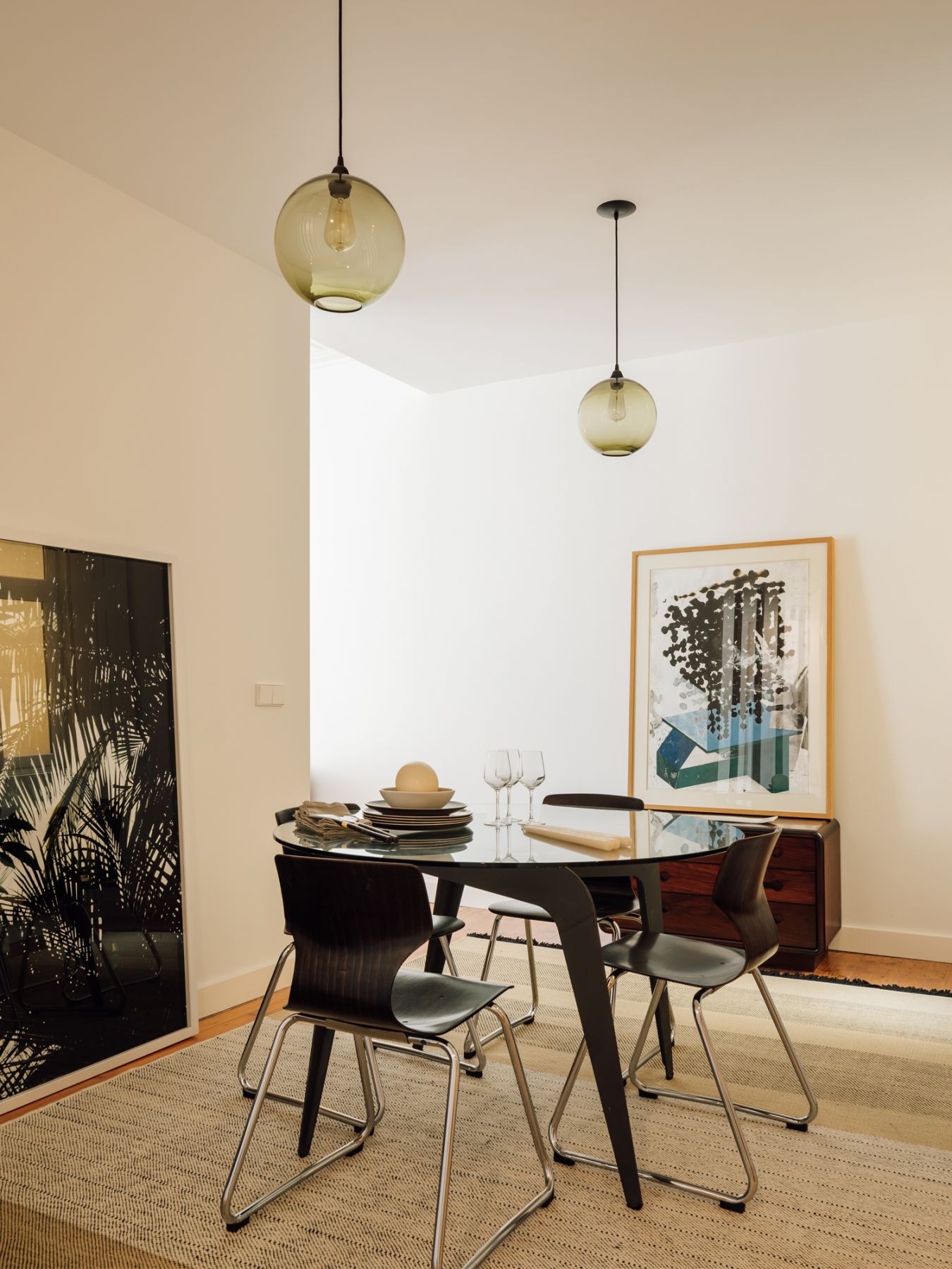 The dining room is layered with artworks and furnishings boasting a tactile appeal