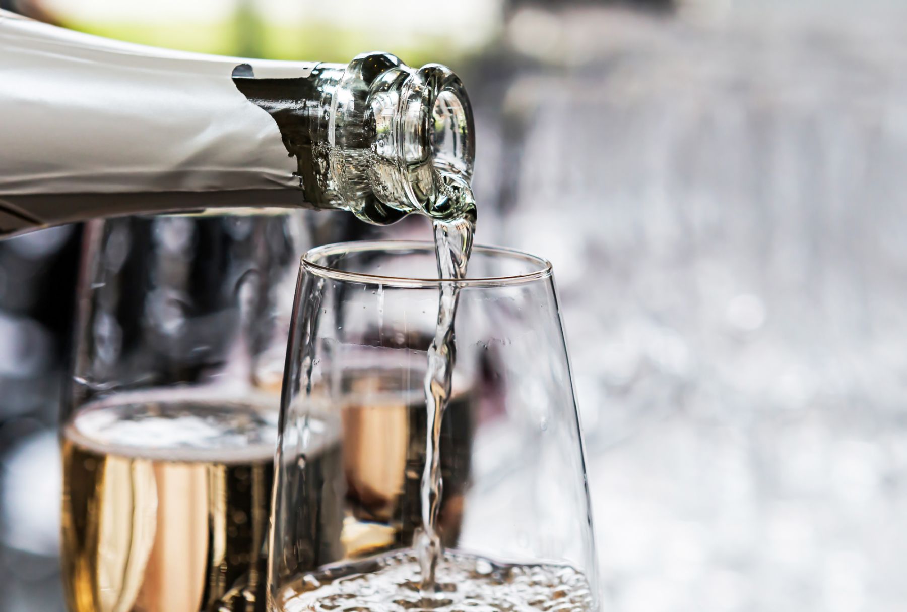 Pouring sparkling wine into a glass