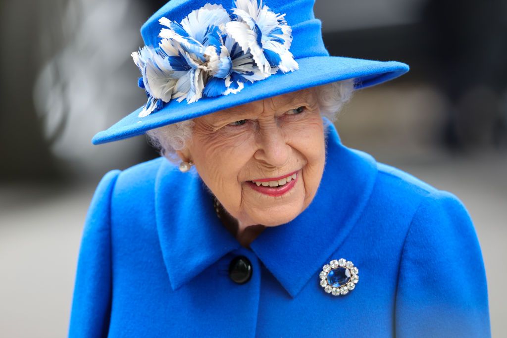 GLASGOW, SCOTLAND - JUNE 30: Queen Elizabeth II during a visit to the Children's Wood Project on June 30, 2021 in Glasgow, Scotland. The Childrenâs Wood Project is a dedicated green space designed to connect local people with nature, raise aspirations and bring the community together through outdoor activities such as gardening, beekeeping and forest schools. The Queen is visiting Scotland for Royal Week between Monday 28th June and Thursday 1st July 2021. (Photo by Chris Jackson/Getty Images)