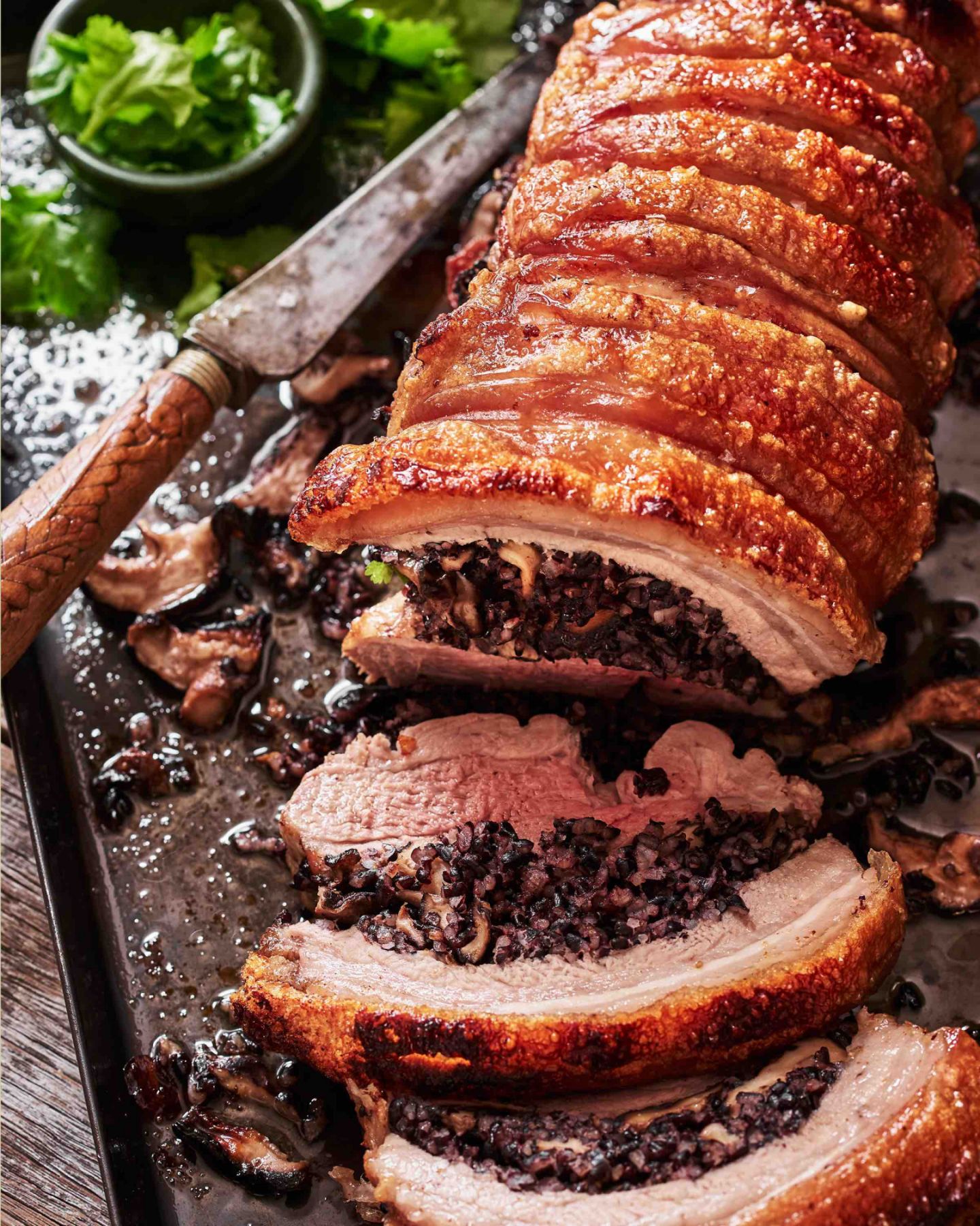 Lechon with shiitake and black rice stuffing