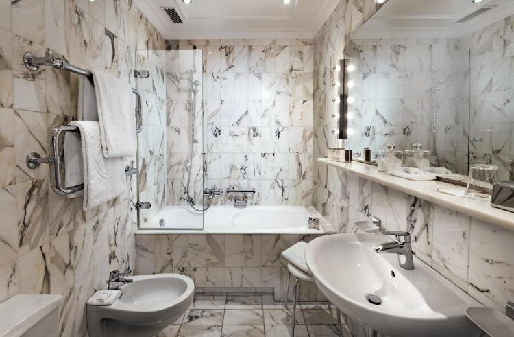 Clad in marble, this bathroom in Excelsior Hotel Ernst exudes a classic sense of elegance (Image: Courtesy of Excelsior Hotel Ernst)