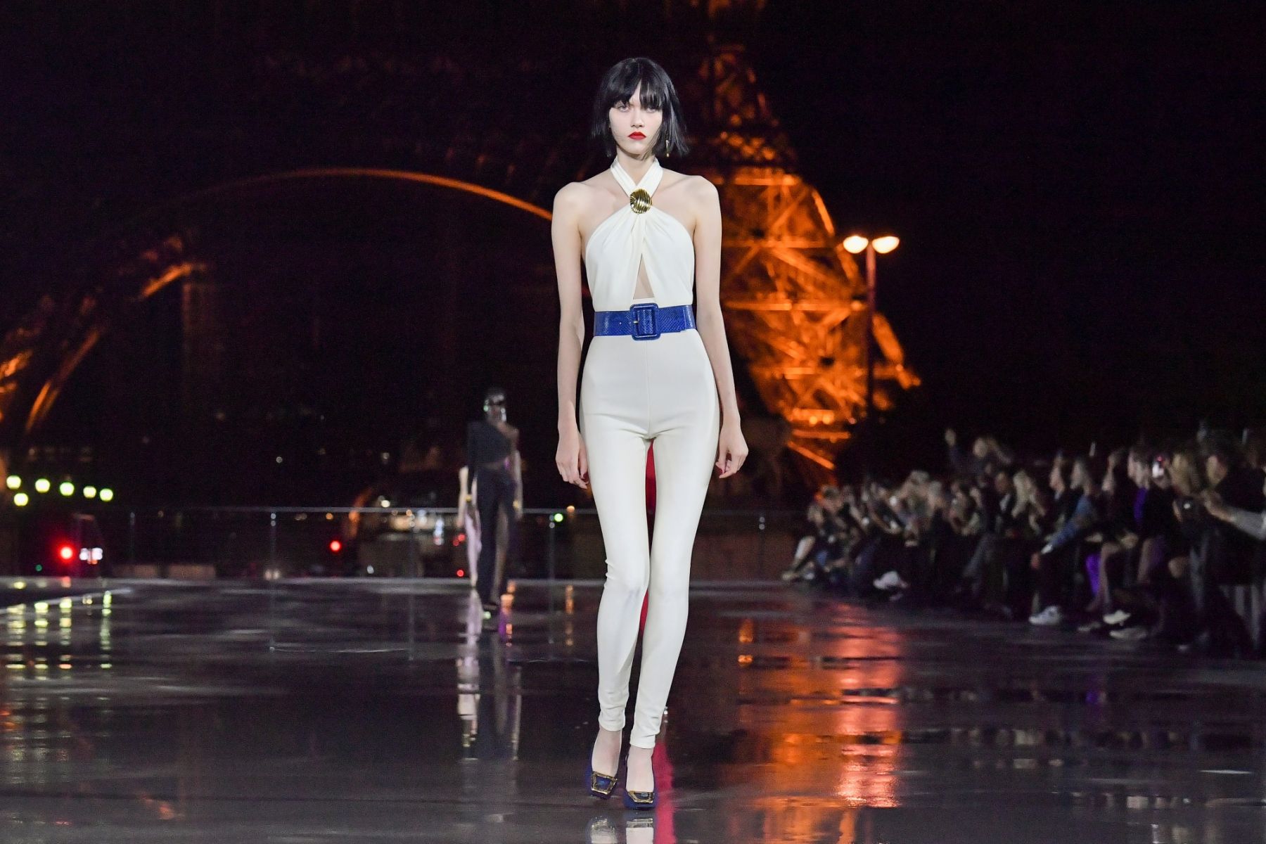 PARIS, FRANCE - SEPTEMBER 28: (EDITORIAL USE ONLY - For Non-Editorial use please seek approval from Fashion House) A model walks the runway during the Saint Laurent Womenswear Spring/Summer 2022 show as part of Paris Fashion Week on September 28, 2021 in Paris, France. (Photo by Stephane Cardinale - Corbis/Corbis via Getty Images)