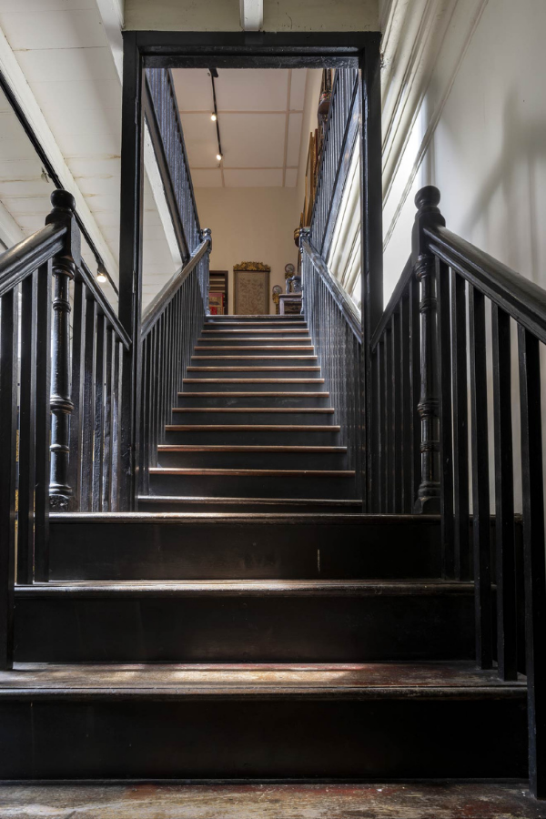Houses such as these used to have two sets of staircases in the house