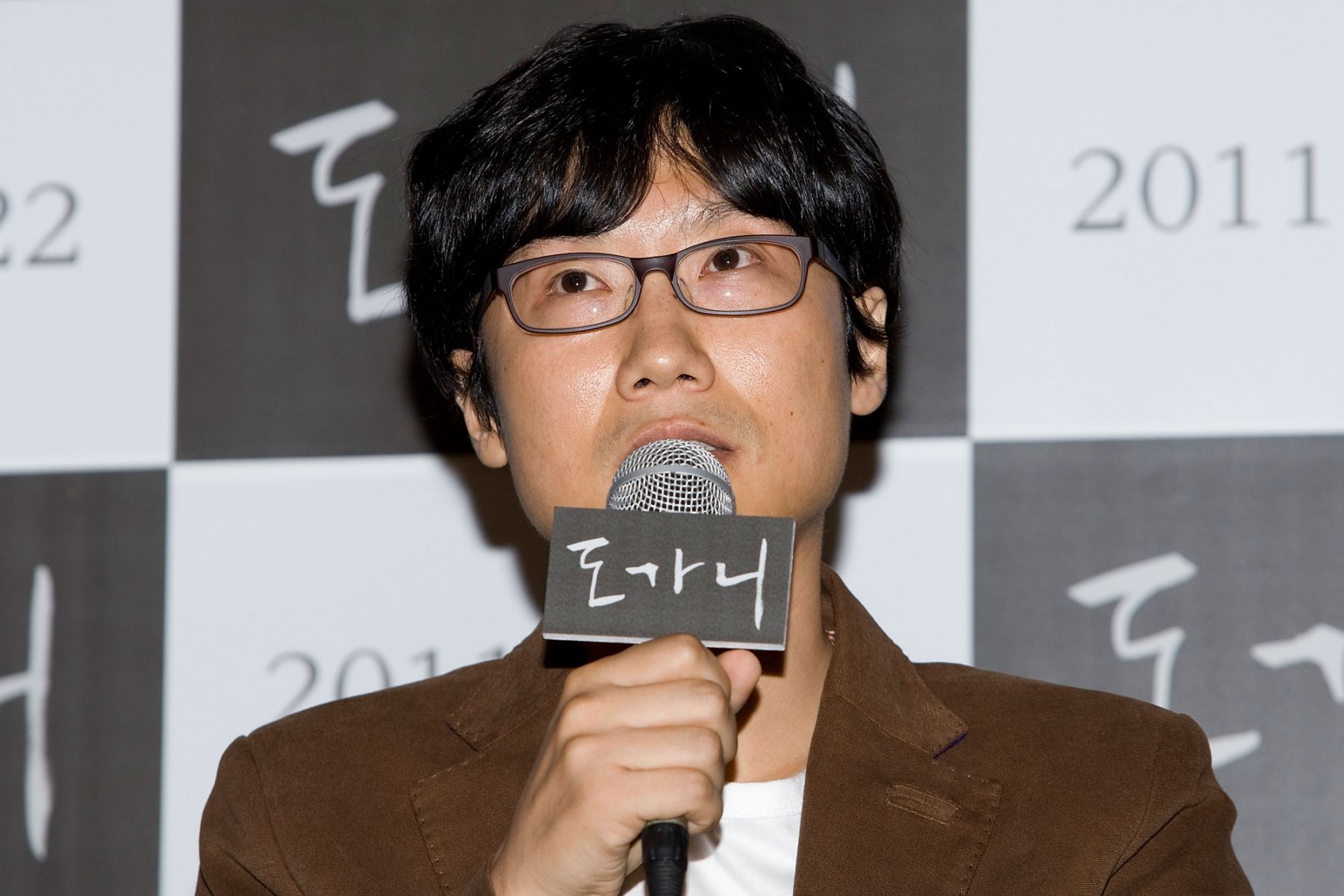 SEOUL, SOUTH KOREA - SEPTEMBER 06: (L-R) Director Hwang Dong-Hyuk attend the "Dogani" Press Screening at Wangsimni CGV on September 6, 2011 in Seoul, South Korea. The film will open on September 22 in South Korea. (Photo by Han Myung-Gu/WireImage)