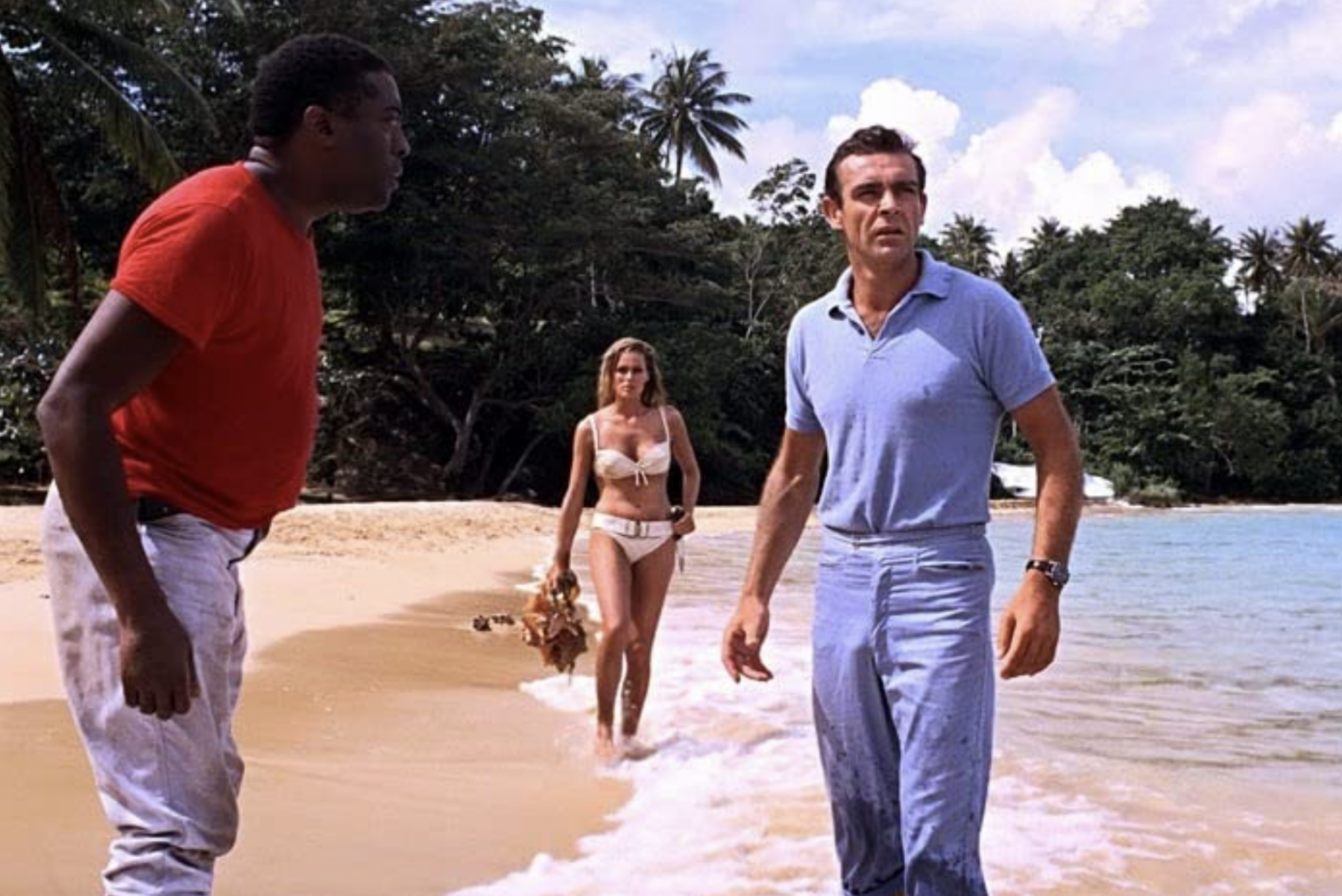Sean Connery, Ursula Andress, and John Kitzmiller in Dr. No, 1962 (Photo: IMDb)