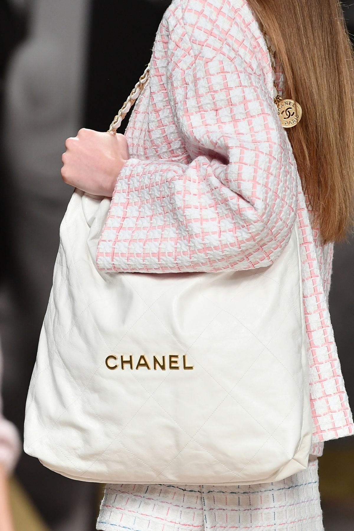 PARIS, FRANCE - OCTOBER 05: (EDITORIAL USE ONLY - For Non-Editorial use please seek approval from Fashion House) A model walks the runway during the Chanel Womenswear Spring/Summer 2022 show as part of Paris Fashion Week on October 05, 2021 in Paris, France. (Photo by Dominique Charriau/WireImage)