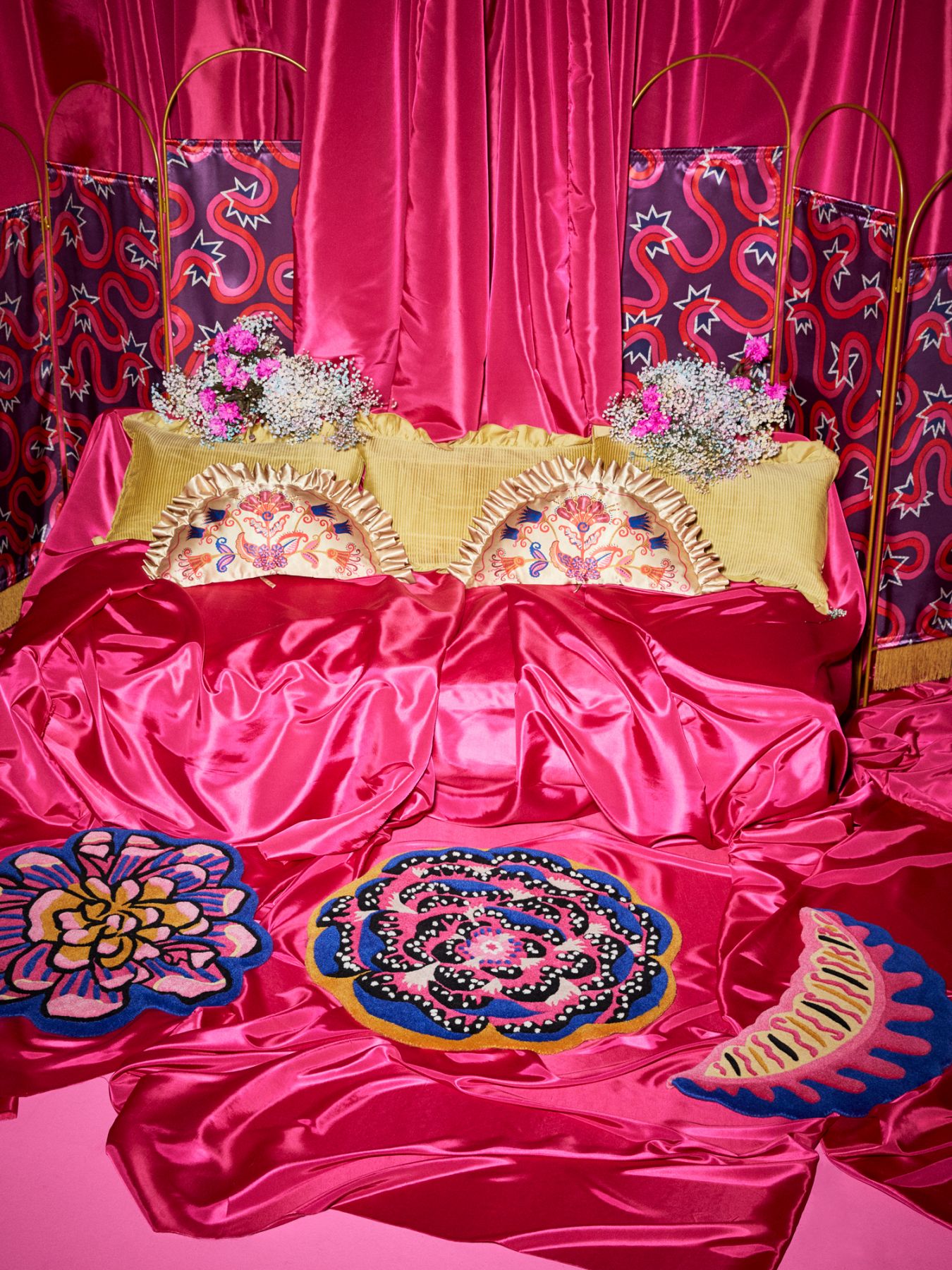 The collection features plenty of neon pink, a reference to Rhodes' signature hot pink bob