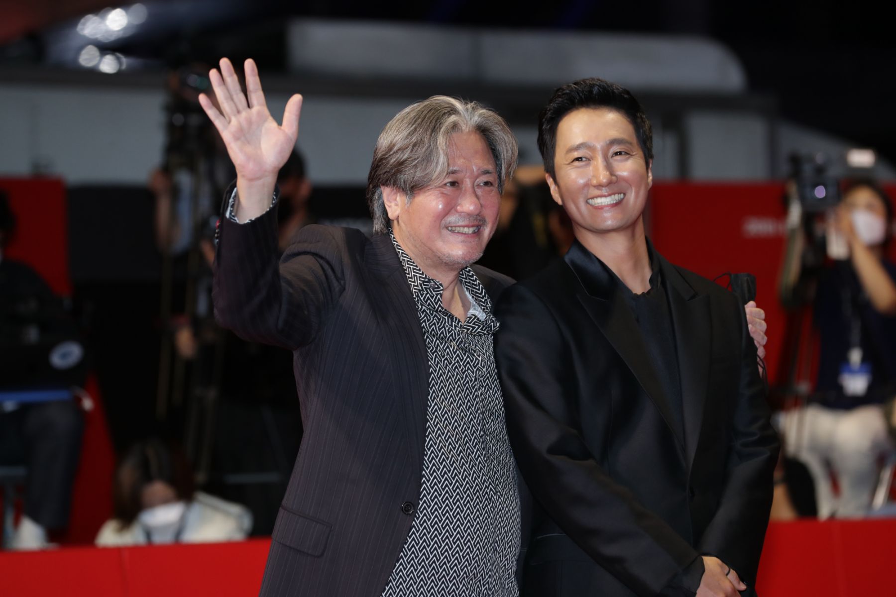 BUSAN, SOUTH KOREA - OCTOBER 06: South Korean actors Choi Min-Sik and Park Hae-Il arrive at the opening ceremony of the 26th Busan International Film Festival at the Busan Cinema Center on October 06, 2021 in Busan, South Korea. (Photo by Han Myung-Gu/WireImage)