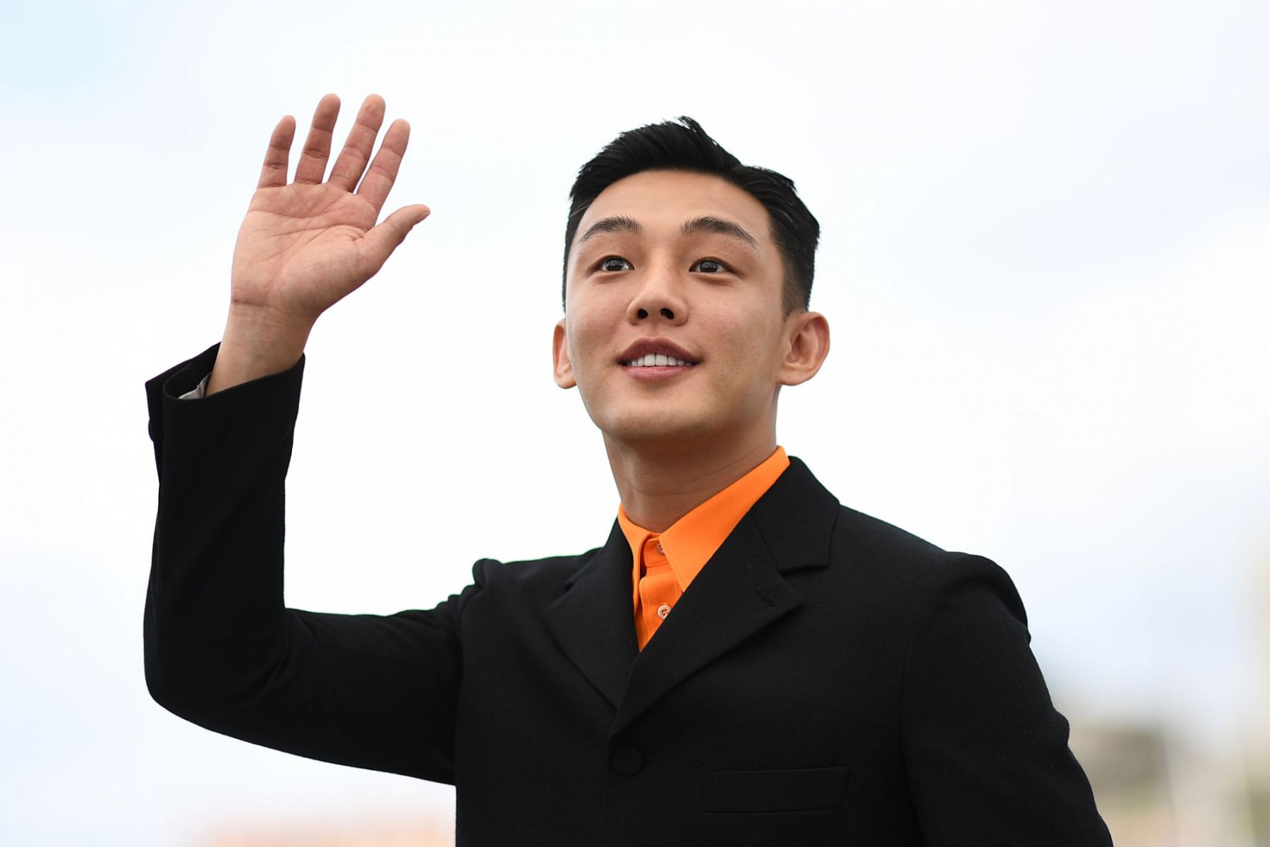 South Korean actor Yoo Ah-in poses on May 17, 2018 during a photocall for the film "Burning" at the 71st edition of the Cannes Film Festival in Cannes, southern France. (Photo by Anne-Christine POUJOULAT / AFP)        (Photo credit should read ANNE-CHRISTINE POUJOULAT/AFP via Getty Images)