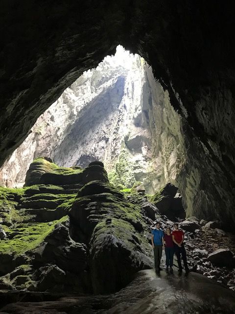 Josianne Robb and sons exploring caves in Vietnam