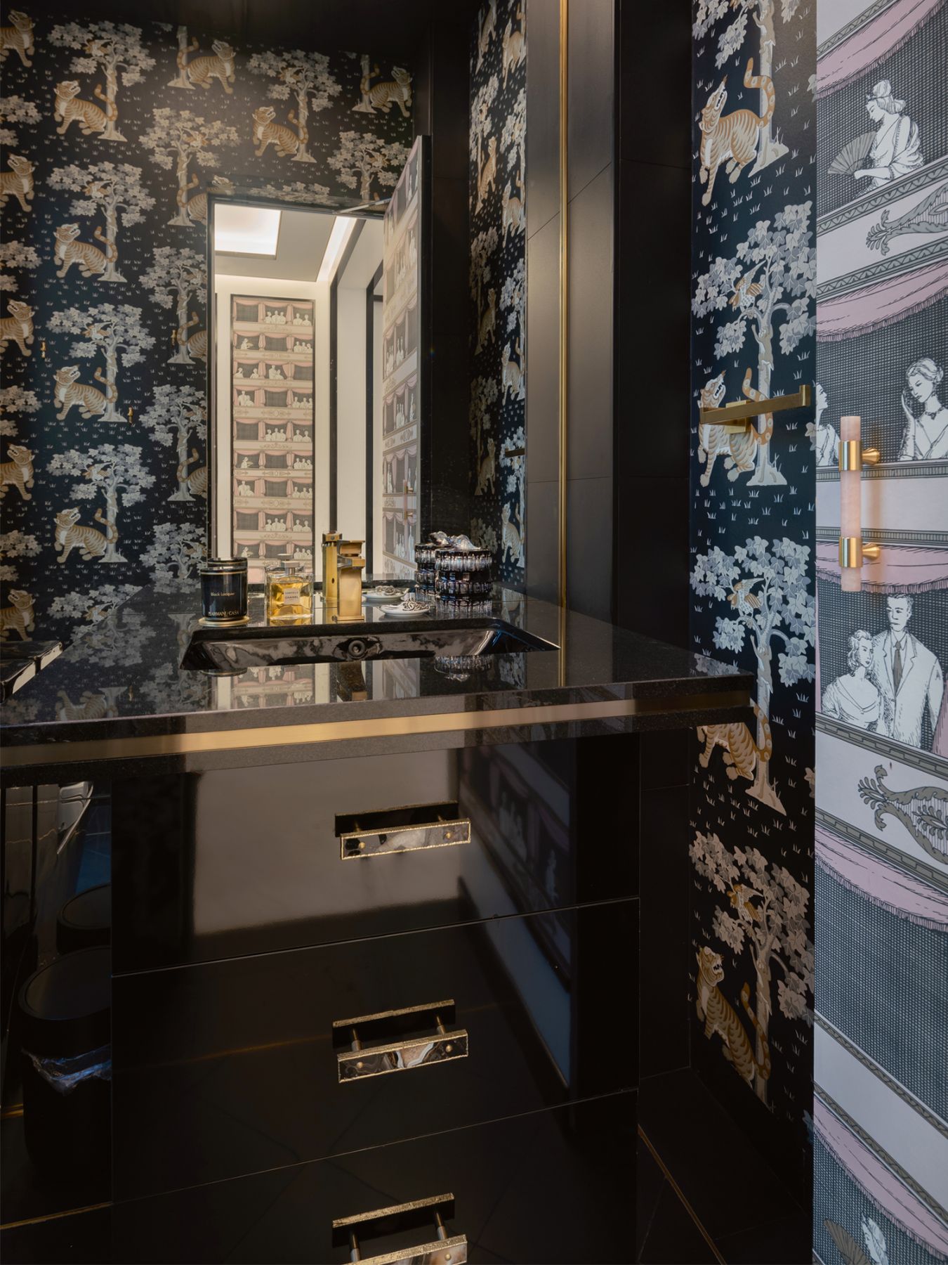 Wallpaper with tiger motifs proffersa lively look in the powder room