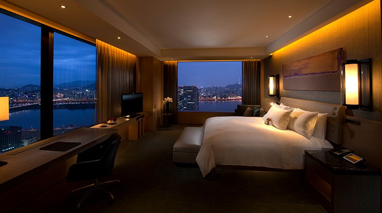 Designed by Arquitectonica, the rooms in Conrad Hotel Seoul features large windows that offer a view of the Han River and Seoul skyline (Image: Courtesy of Conrad Hotel Seoul)
