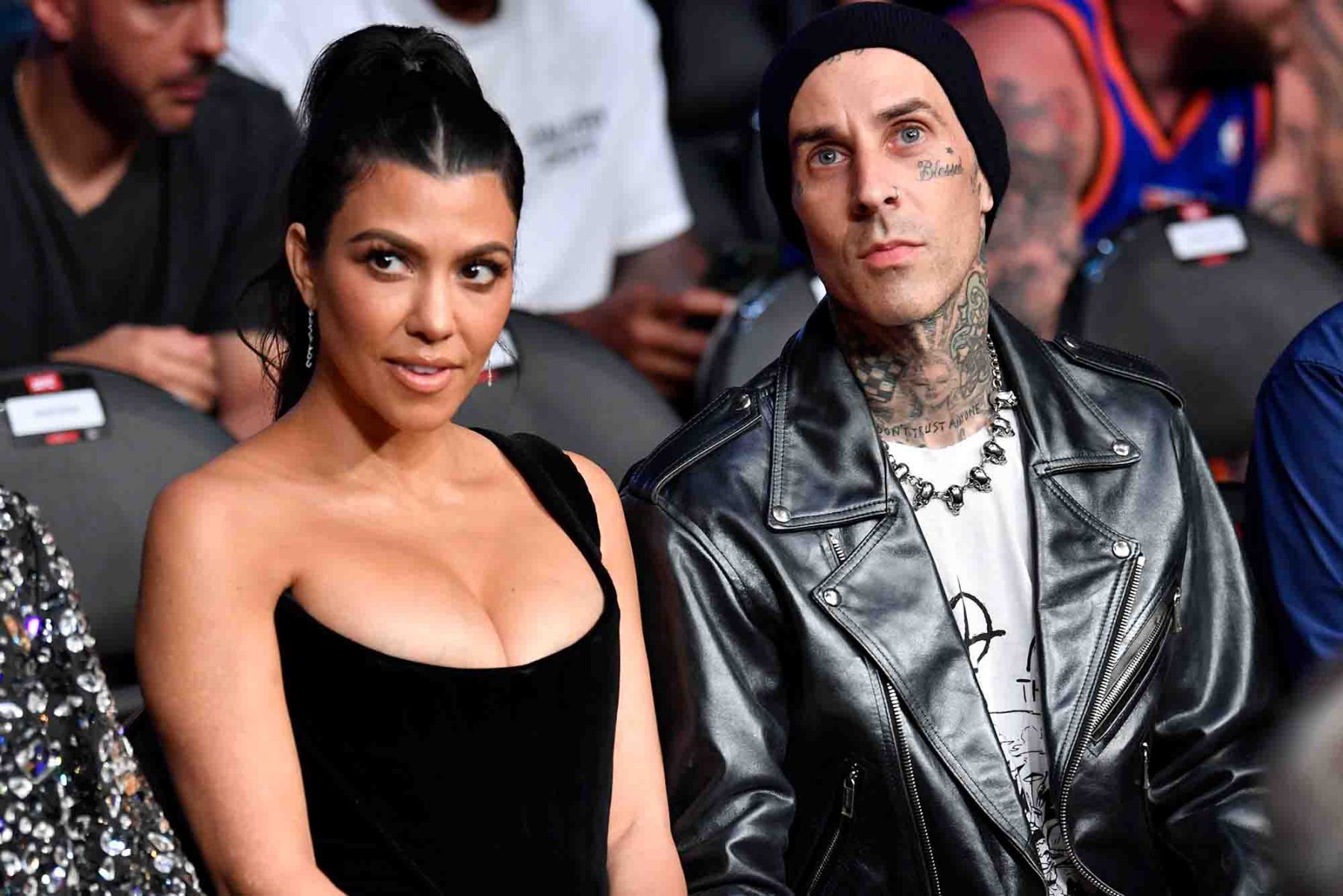 Kourtney Kardashian and Travis Barker are seen in attendance during the UFC 264 event. (Photo: Getty Images)