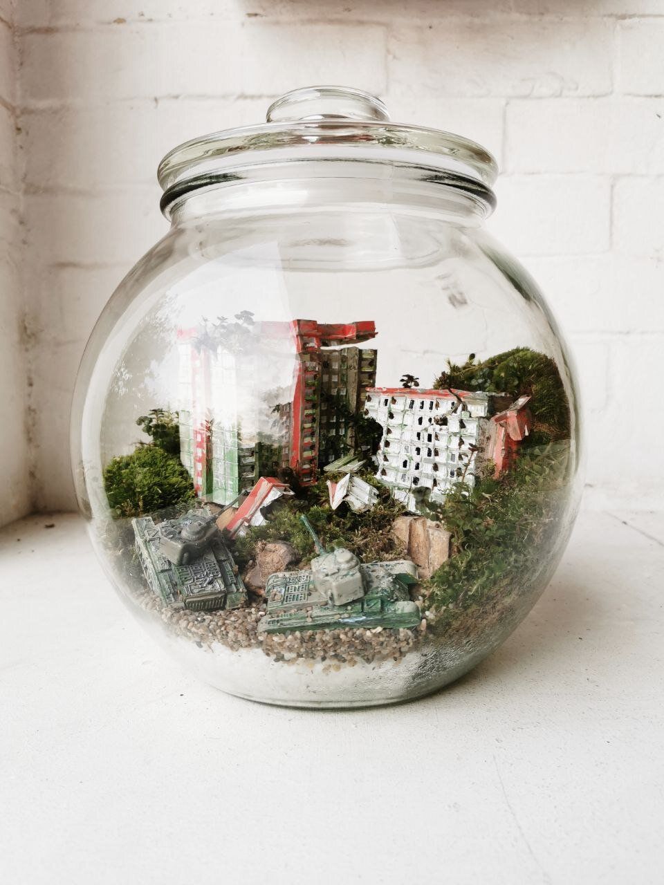 The post-apocalyptic Singapore moss bowl includes 3D printed and painted HDB blocks and a war-torn theme (Image: Courtesy of InOut Atelier)