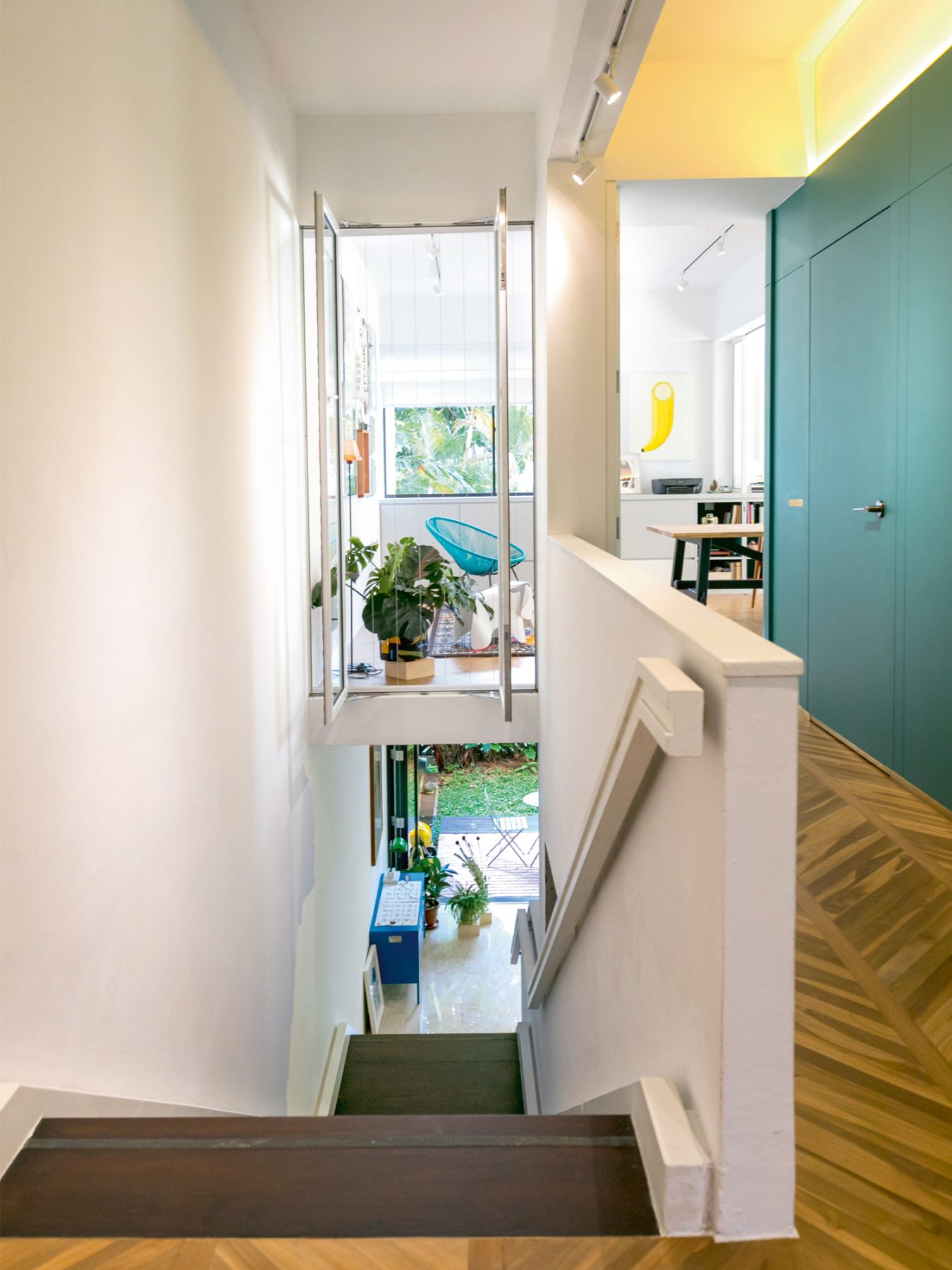 Green is the dominant accent colour in the second storey